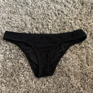 ROXY. Black bathing suit bottom.